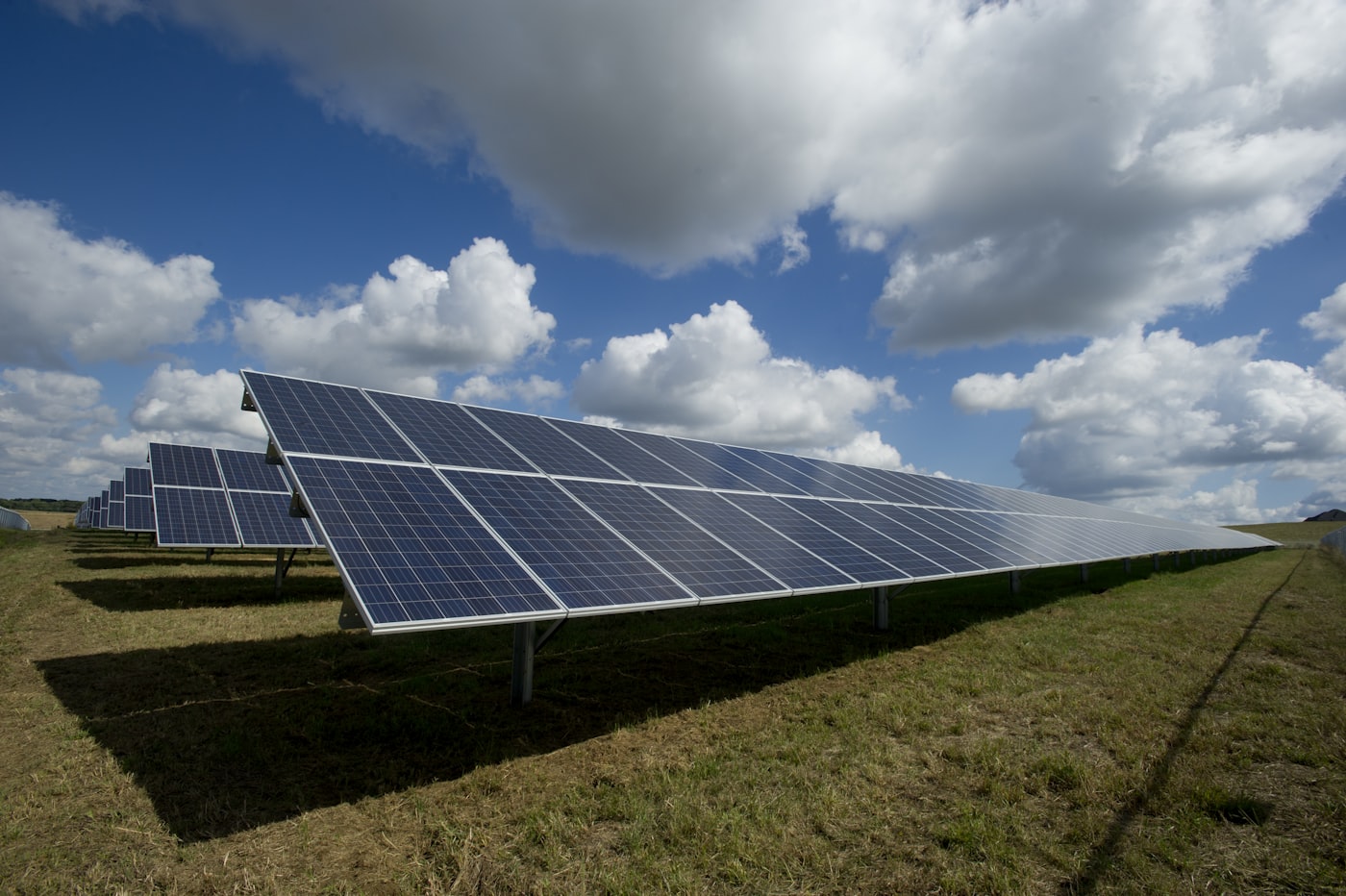 Rooftop solar panel array under a clear sky